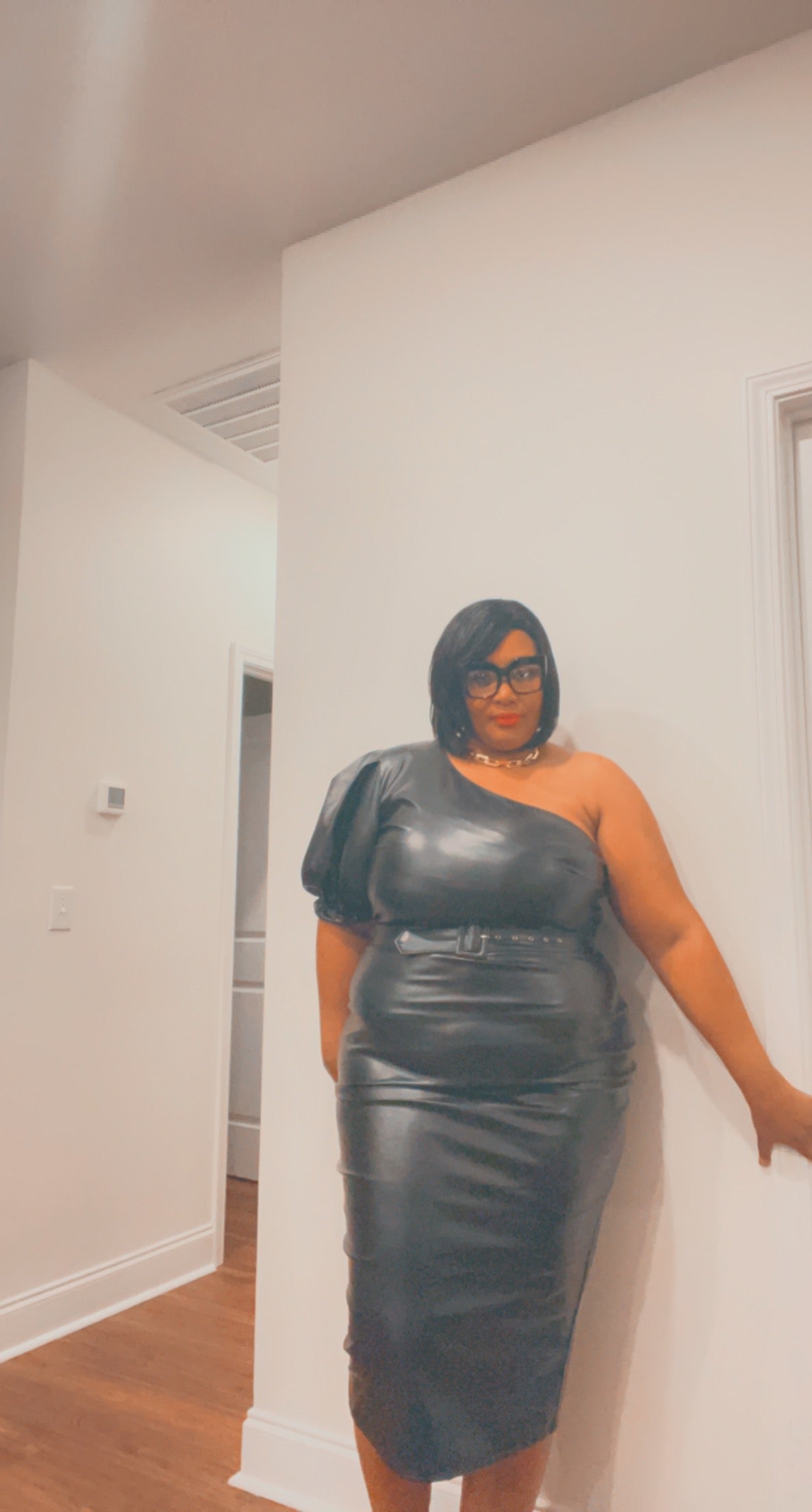 Cold shoulder leather dress